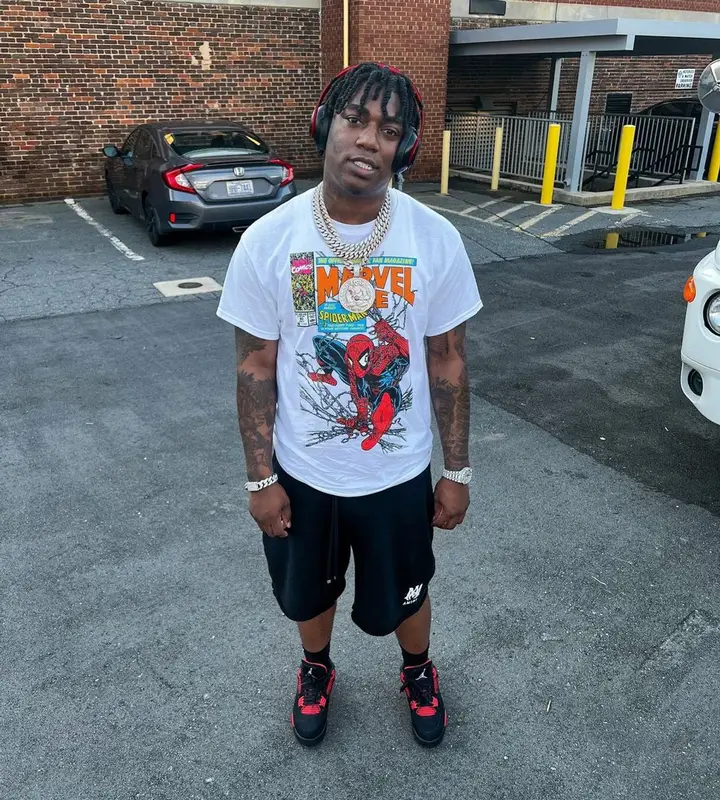 Fredo Bang outfit in Vintage, Amiri, and Jordan, 2022