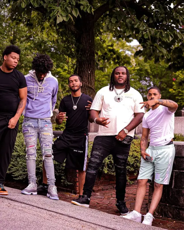 Tee Grizzley outfit in Gallery Dept., Amiri, and Saint Laurent, 2022