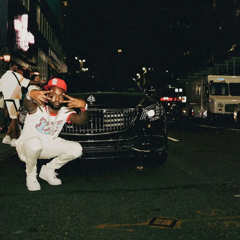 Meek Mill outfit in Louis Vuitton, Amiri, and Nike, 2022