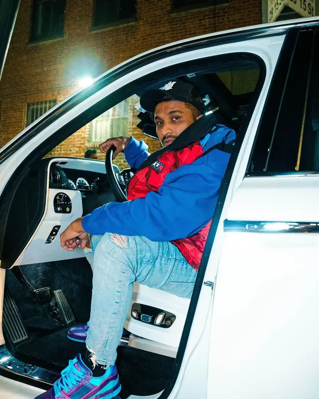 Divine outfit in Tommy Hilfiger, Amiri, and Aape, 2022