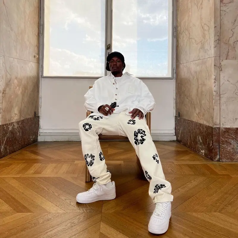 Joey Badass outfit in Raf Simons, Denim Tears, and Kuboraum, 2022