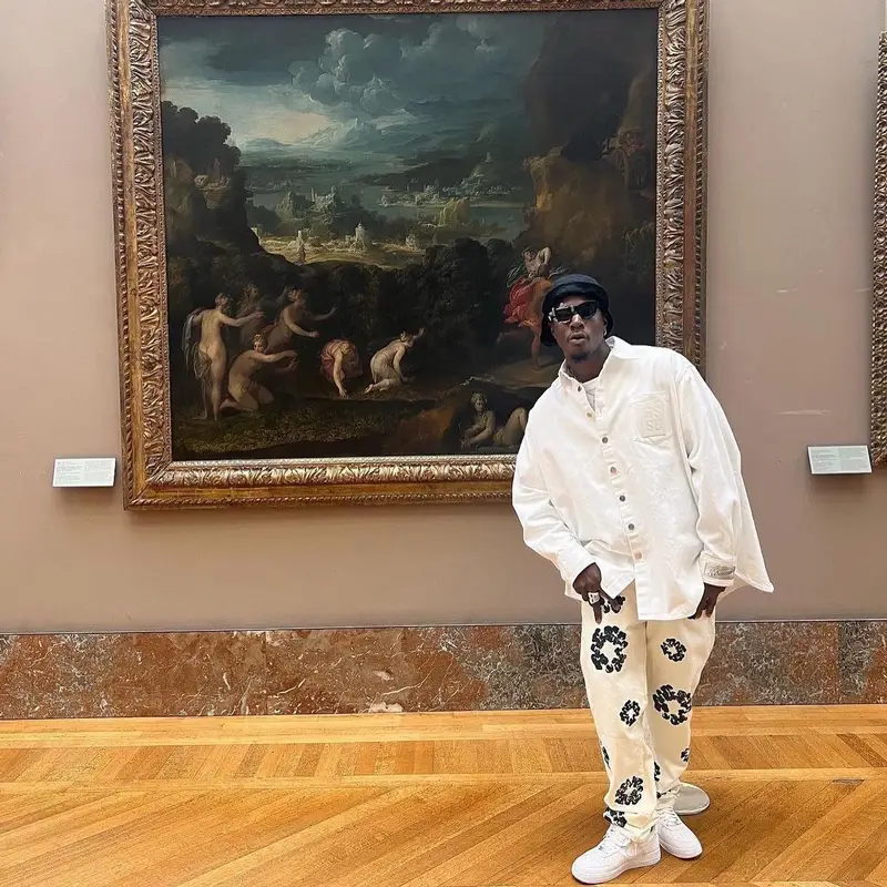 Joey Badass outfit in Raf Simons, Denim Tears, and Kuboraum, 2022