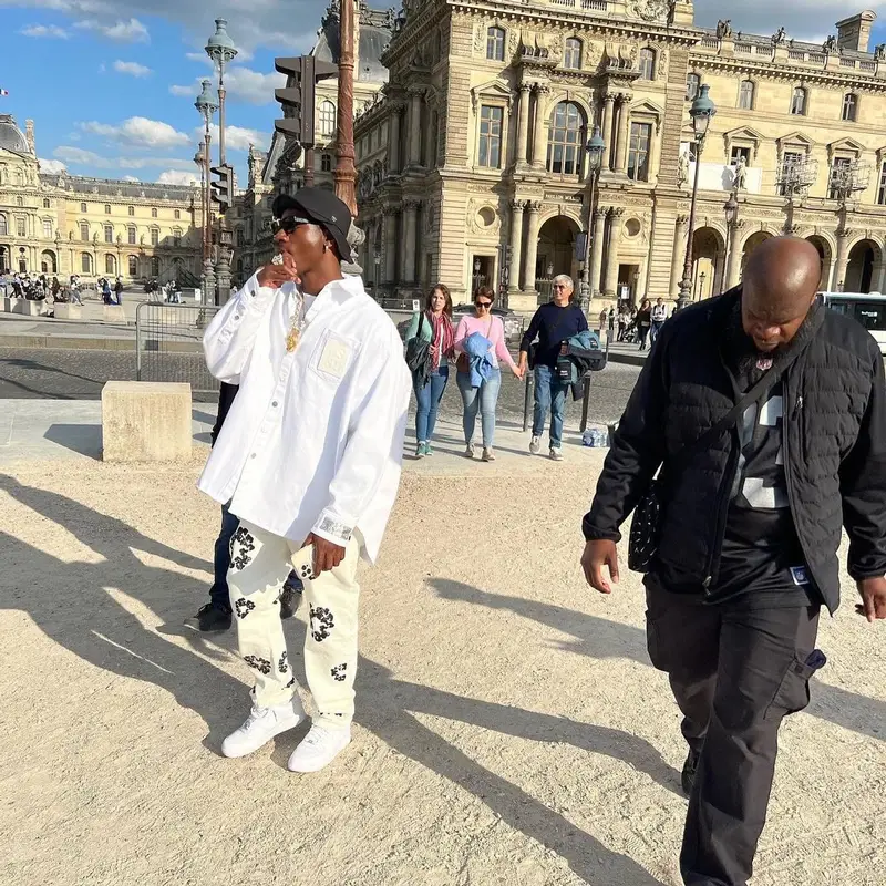 Joey Badass outfit in Raf Simons, Denim Tears, and Kuboraum, 2022