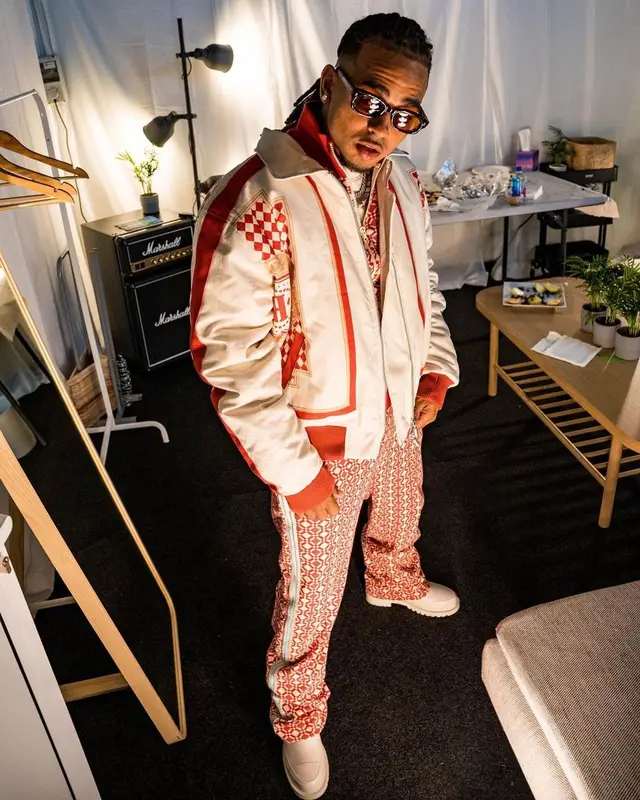 Ozuna outfit in Rhude, CamperLab, and Wales Bonner, 2022