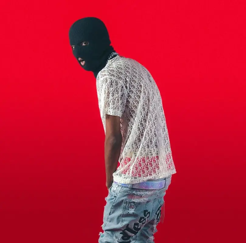 MC Stan outfit in Dior, Vlone, and Louis Vuitton, 2022