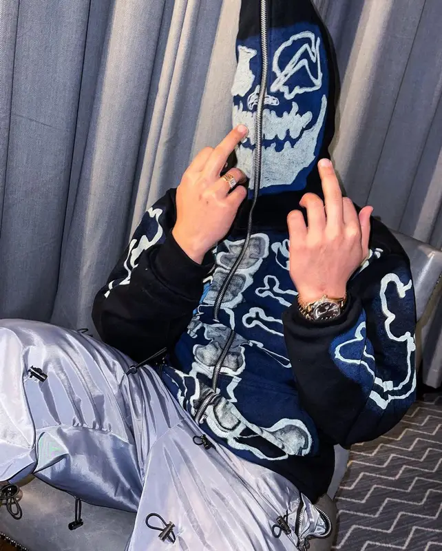 Gurinder Gill outfit in Travis Scott Merch, Jordan, and Fragment, 2022