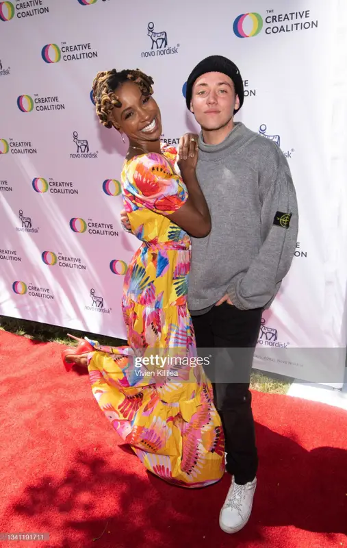 Ethan Cutkosky outfit in Stone Island, Ksubi, and Vans, 2021