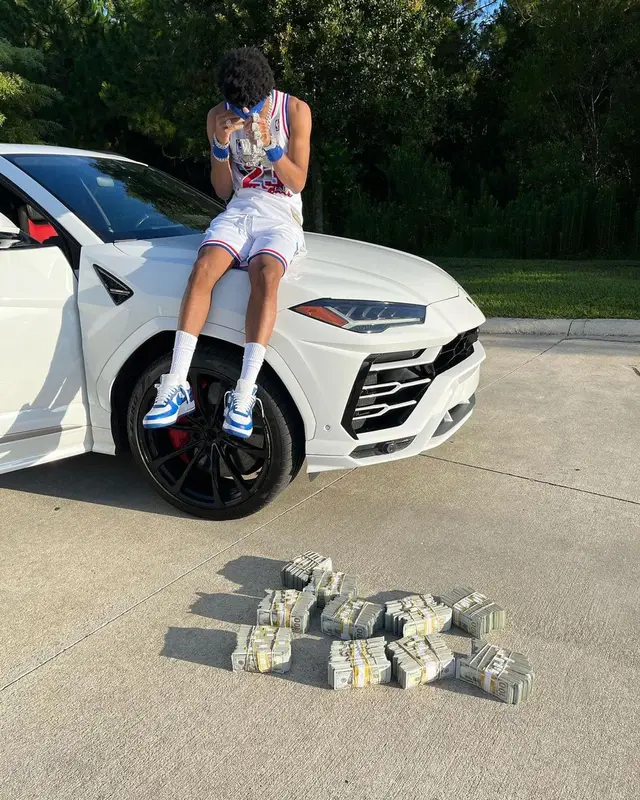 Nardo Wick outfit in Mitchell & Ness, Louis Vuitton, and Nike, 2022