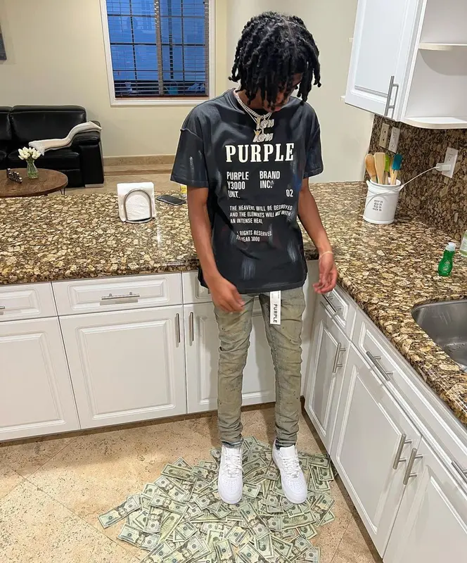 Lil Darius outfit in Purple Brand and Nike, 2022