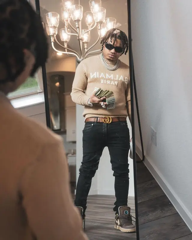 No Cap outfit in Balmain, Gucci, and Prada, 2022