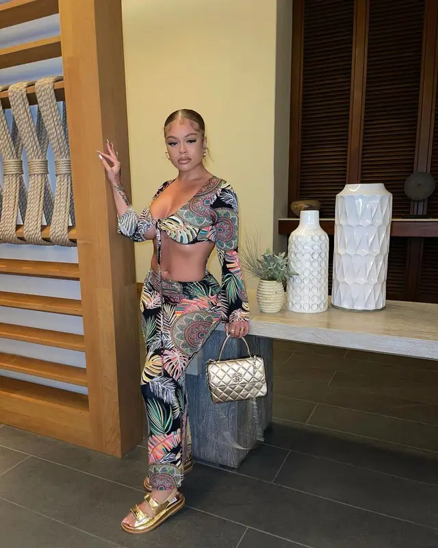 Latto outfit in Chanel, FashionNova, and Gucci, 2022