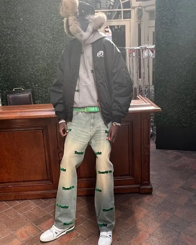 Bol Bol outfit in Louis Vuitton, Aris Tatalovich, and Prada, 2022