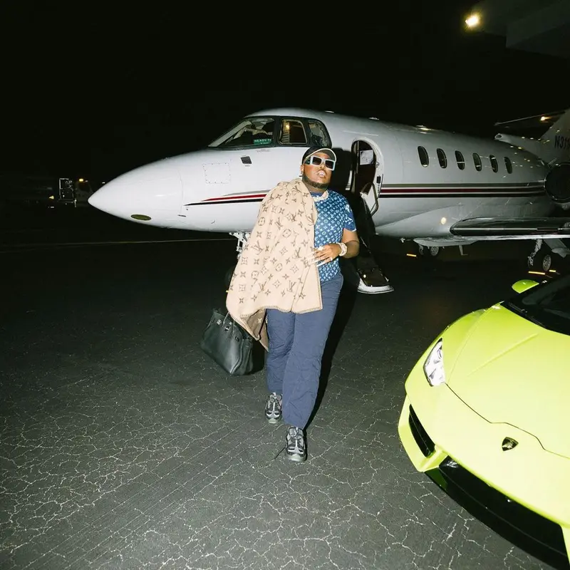 Saucy Santana outfit in Hermes and Louis Vuitton, 2022