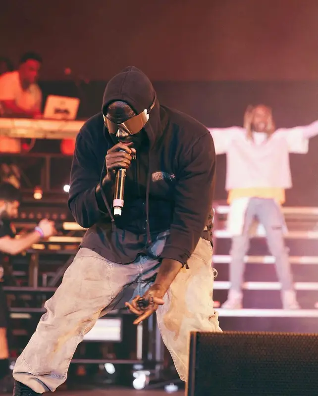 Kanye West outfit in Vintage, Yeezy, and GAP, 2022
