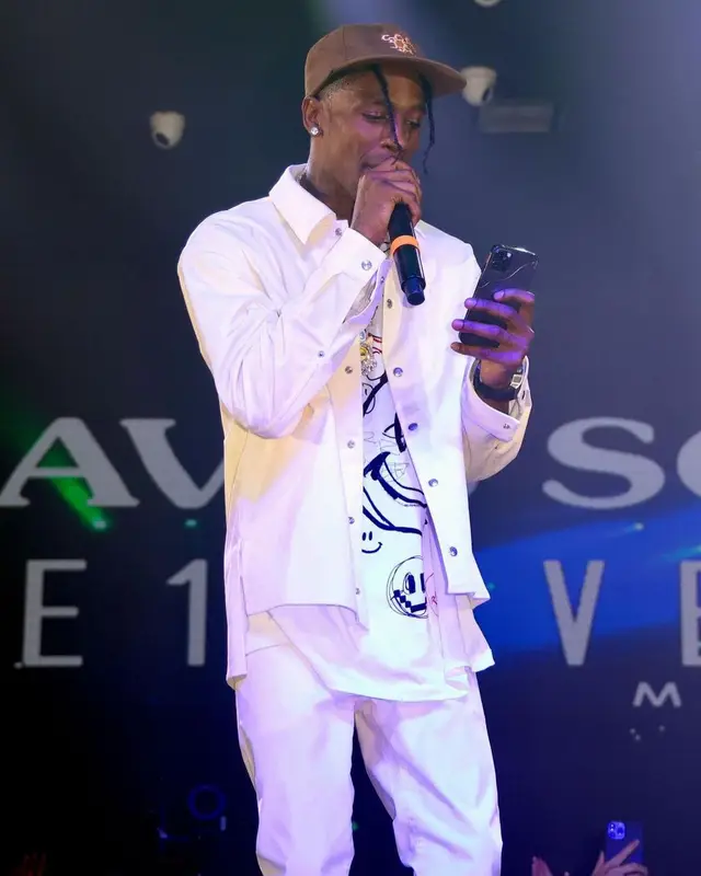 Travis Scott outfit in Dior, Raf Simons, and Cactus Jack, 2022