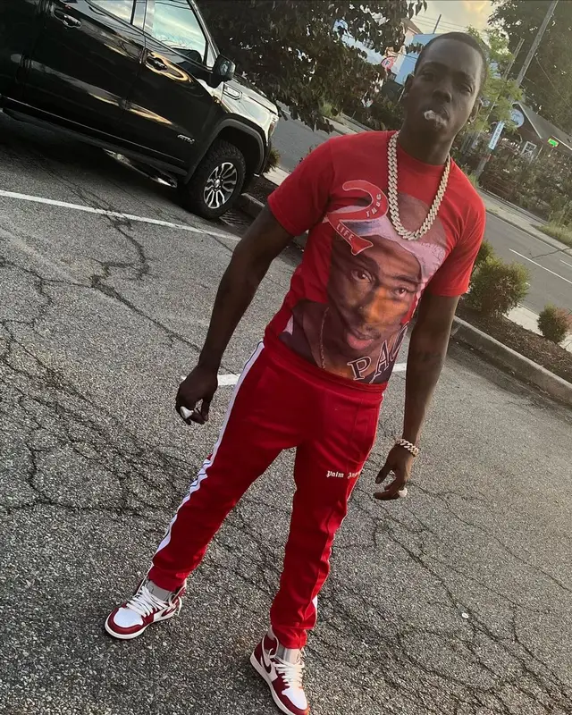 Bobby Shmurda outfit in Vintage, Palm Angels, and Nike, 2022