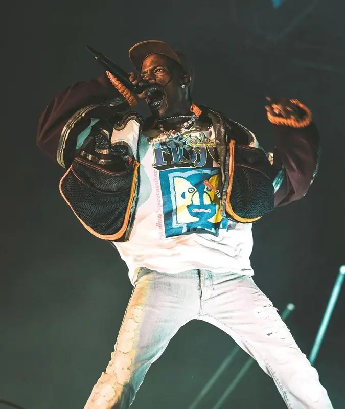 Travis Scott outfit in Vintage, Dior, and Travis Scott Merch, 2022
