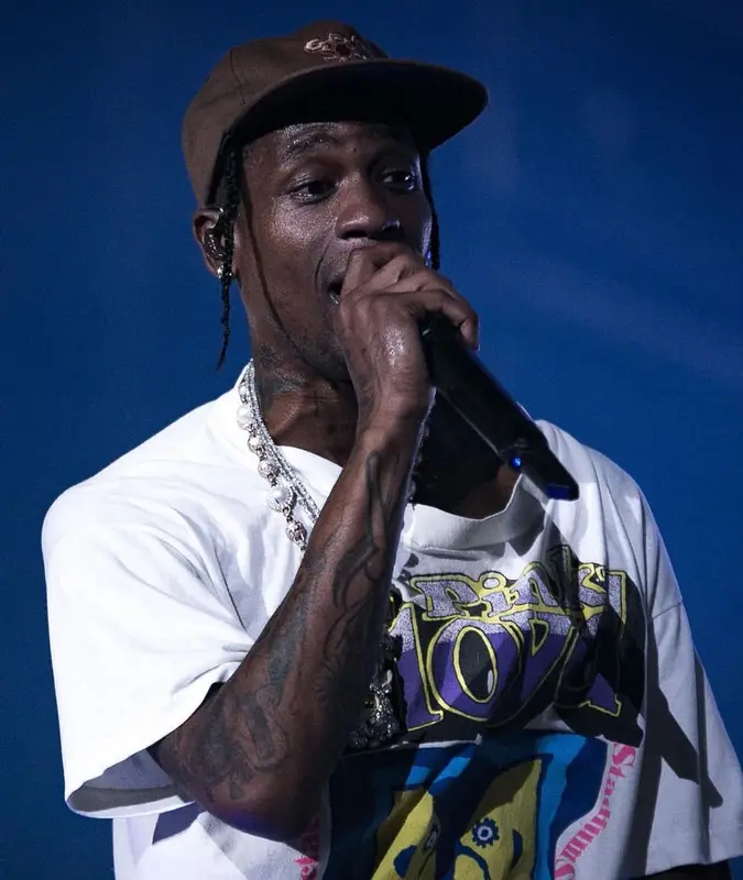 Travis Scott outfit in Vintage, Dior, and Travis Scott Merch, 2022