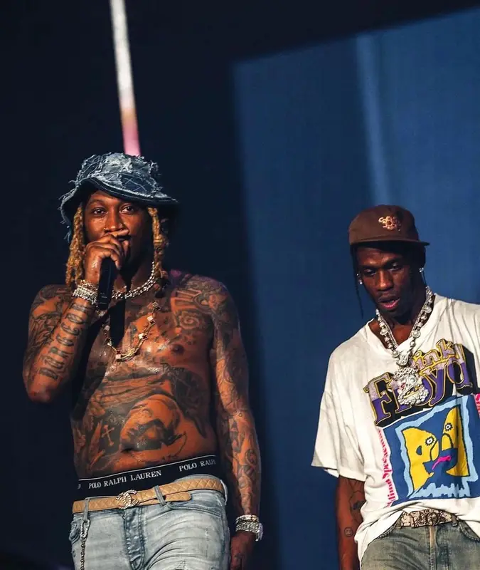 Travis Scott outfit in Vintage, Dior, and Travis Scott Merch, 2022