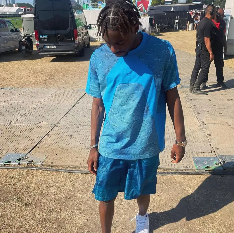 Tiakola outfit in Louis Vuitton and Nike, 2022