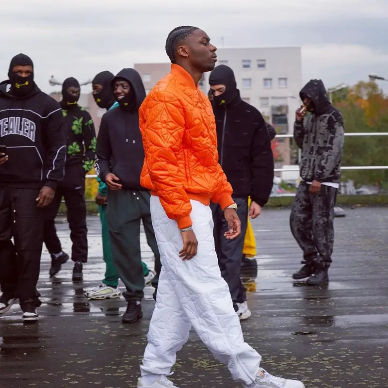 Tiakola outfit in Louis Vuitton and Nike, 2021