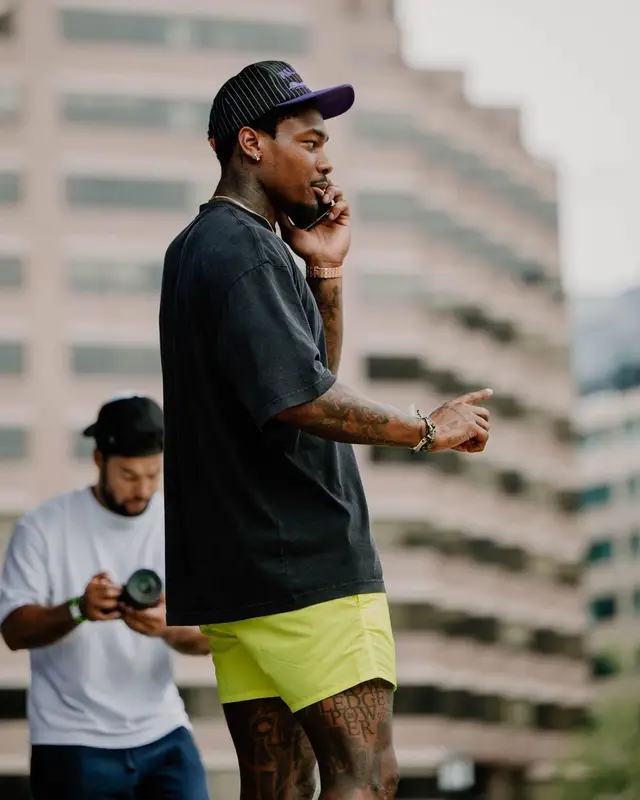 Stefon Diggs outfit in Balenciaga and Louis Vuitton, 2022