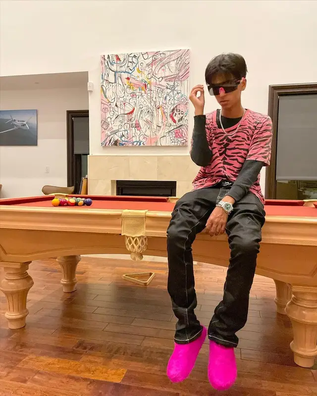Yung Fazo outfit in Saint Laurent, Vivienne Westwood, and Louis Vuitton, 2022