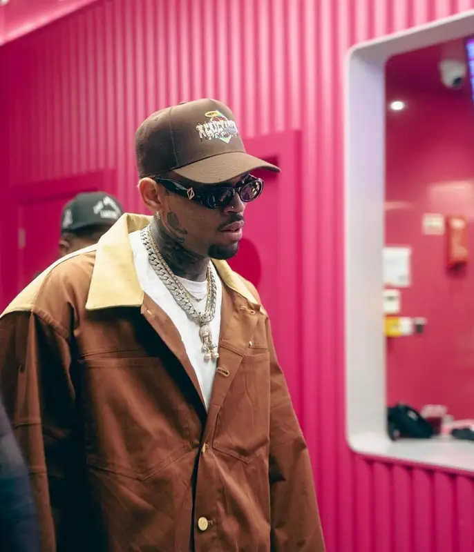 Chris Brown outfit in Dior and Pheit, 2022