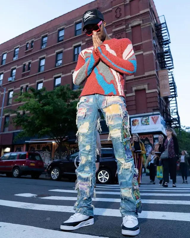 Swoosh God outfit in Who Decides War, Louis Vuitton, and Barriers, 2022