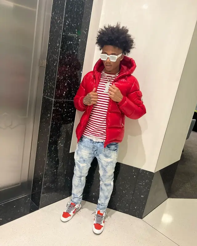 Mikey outfit in Moncler, Comme Des Garcons, and Louis Vuitton, 2022