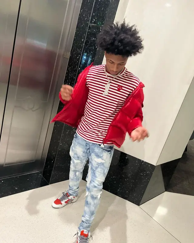 Mikey outfit in Moncler, Comme Des Garcons, and Louis Vuitton, 2022