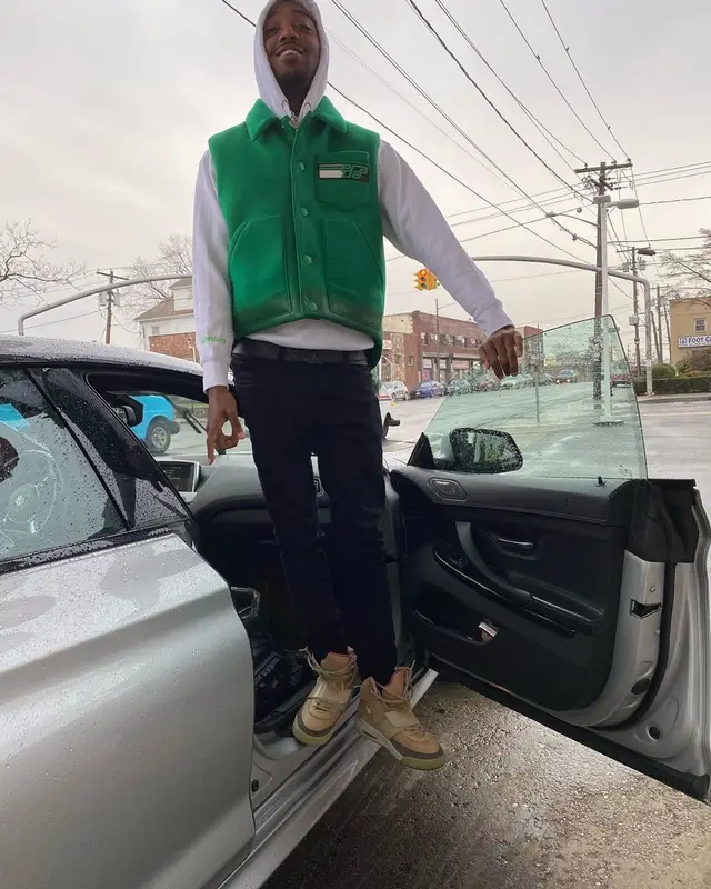 Swoosh God outfit in Prada, Nike, and Louis Vuitton, 2020