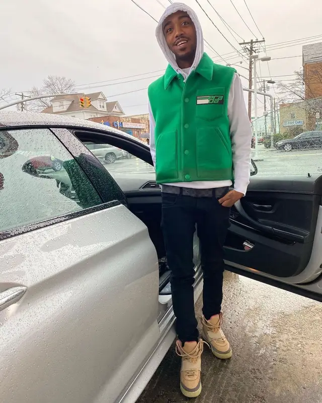 Swoosh God outfit in Prada, Nike, and Louis Vuitton, 2020