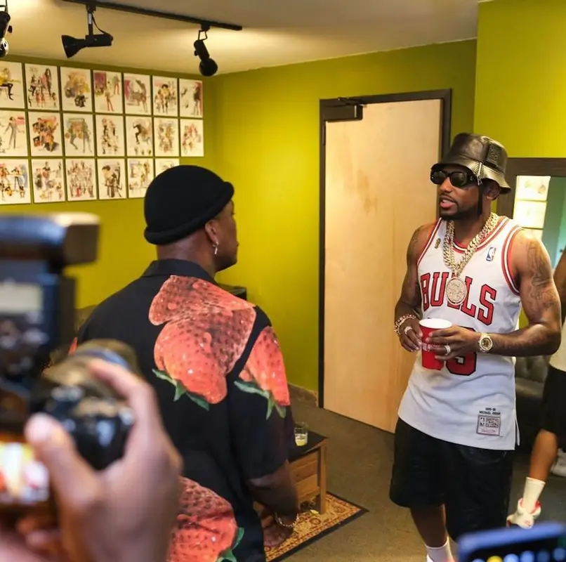 Fabolous outfit in Mitchell & Ness, Jordan, and Loewe, 2022