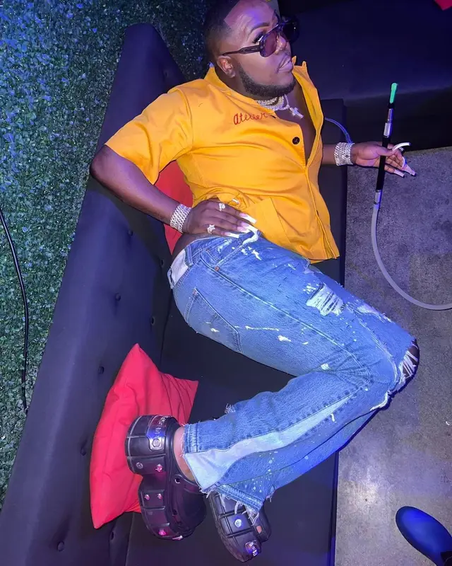 Saucy Santana outfit in Gallery Dept., Balenciaga, and Crocs, 2022