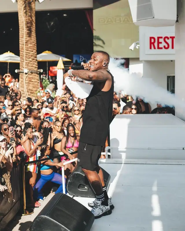 DaBaby outfit in Balenciaga, Louis Vuitton, and Amiri, 2022