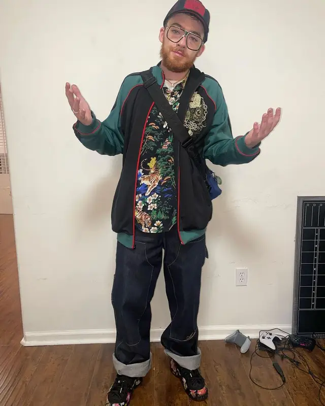 Angus Cloud outfit in Polo Ralph Lauren, Nike, and True Religion, 2022