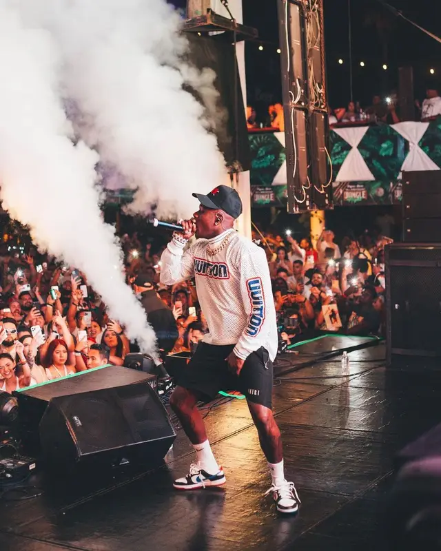 DaBaby outfit in Louis Vuitton, Amiri, and Nike, 2022