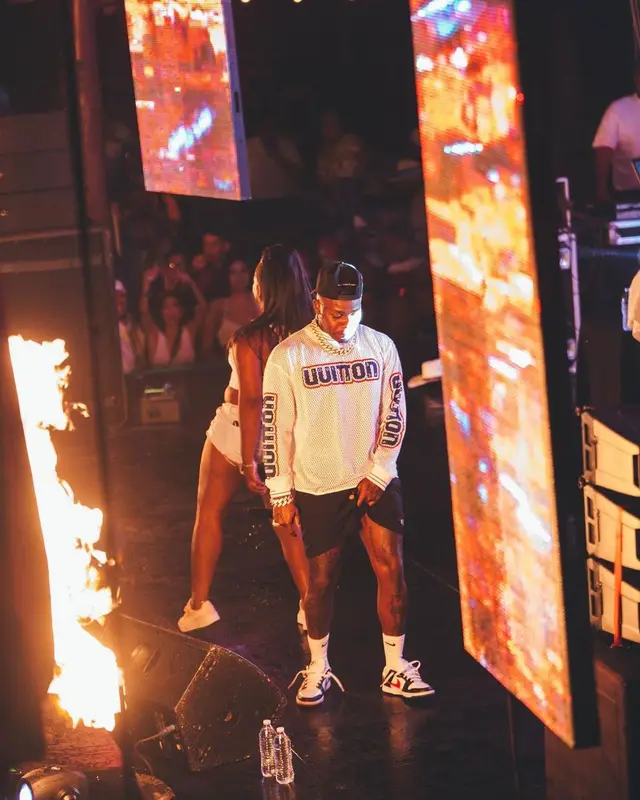DaBaby outfit in Louis Vuitton, Amiri, and Nike, 2022