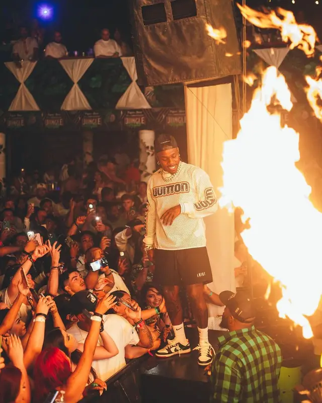 DaBaby outfit in Louis Vuitton, Amiri, and Nike, 2022