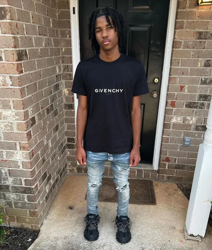 Lil Darius outfit in Givenchy, Amiri, and Balenciaga, 2022