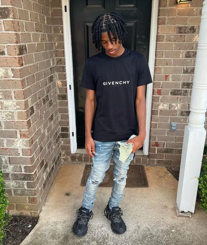 Lil Darius outfit in Givenchy, Amiri, and Balenciaga, 2022