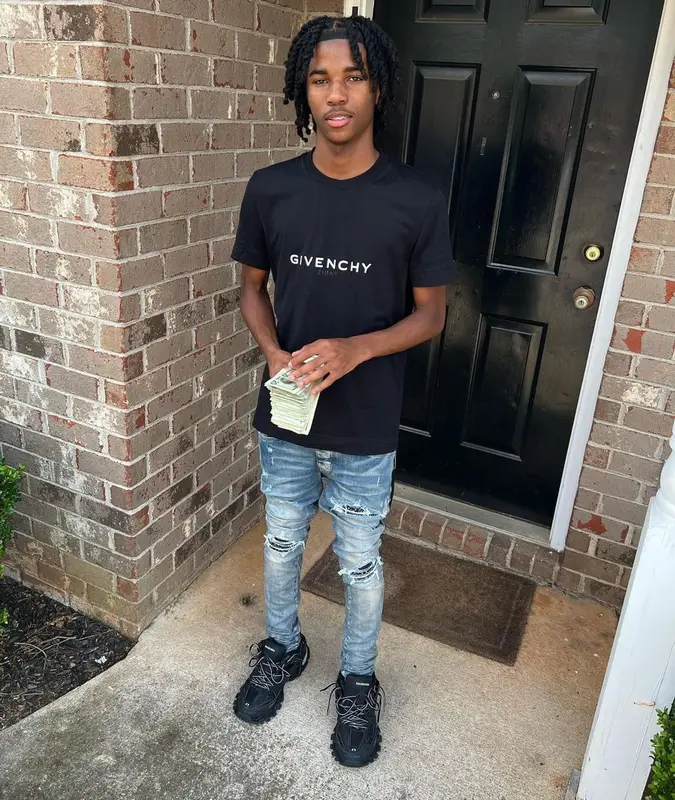 Lil Darius outfit in Givenchy, Amiri, and Balenciaga, 2022