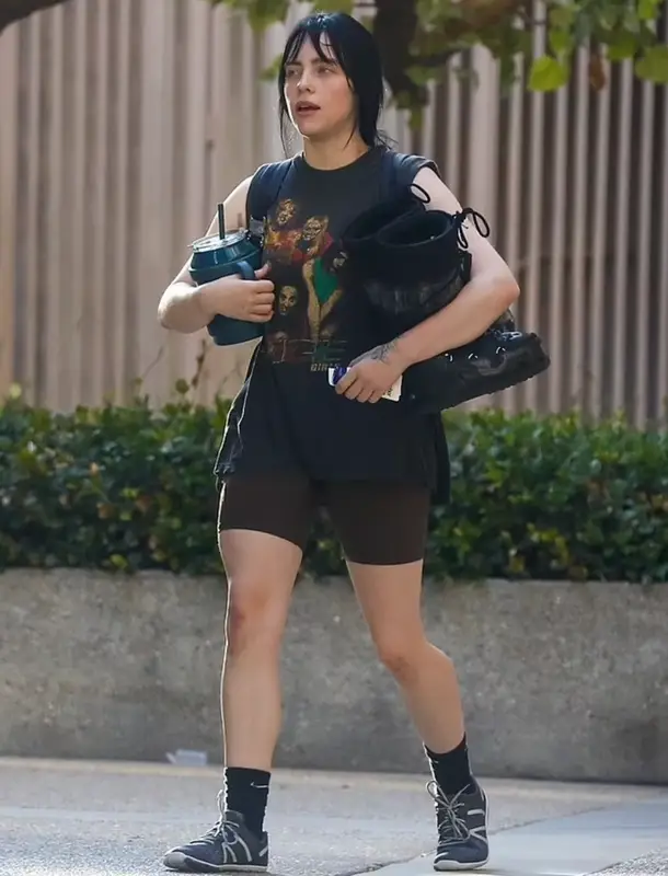 Billie Eilish outfit in Xero Shoes, Moon Boot, and Alyx, 2022