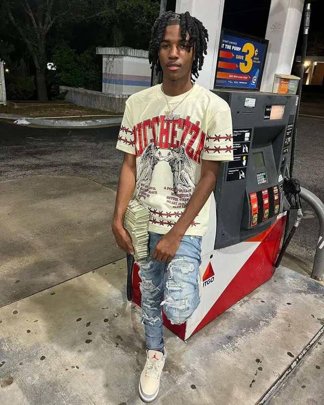 Lil Darius outfit in Ricchezza Forever, Amiri, and Jordan, 2022