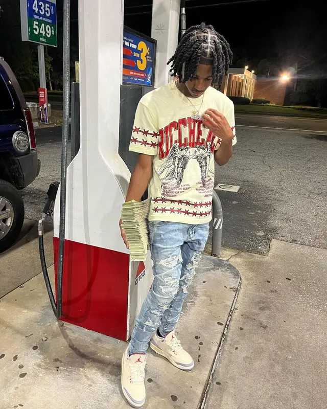 Lil Darius outfit in Ricchezza Forever, Amiri, and Jordan, 2022
