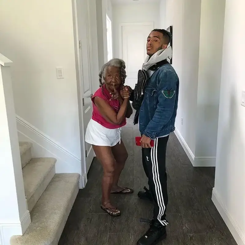 XXXTentacion outfit in Gucci, Adidas, and Louis Vuitton, 2018