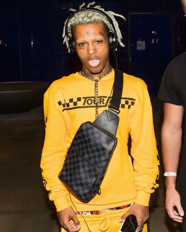 XXXTentacion outfit in H&M, Beats by Dre, and Justin Bieber Merch, 2018