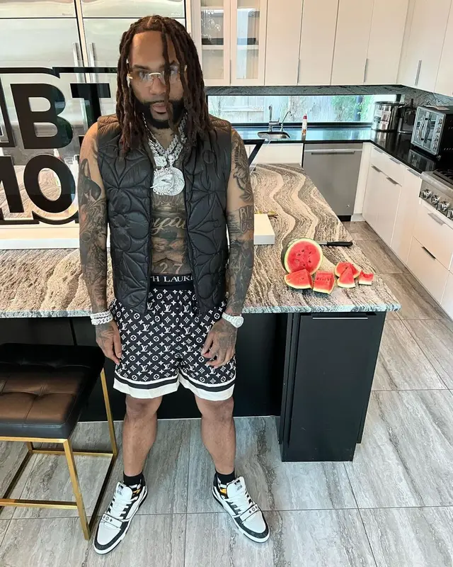 Money Man outfit in Louis Vuitton, Cartier, and Polo Ralph Lauren, 2022