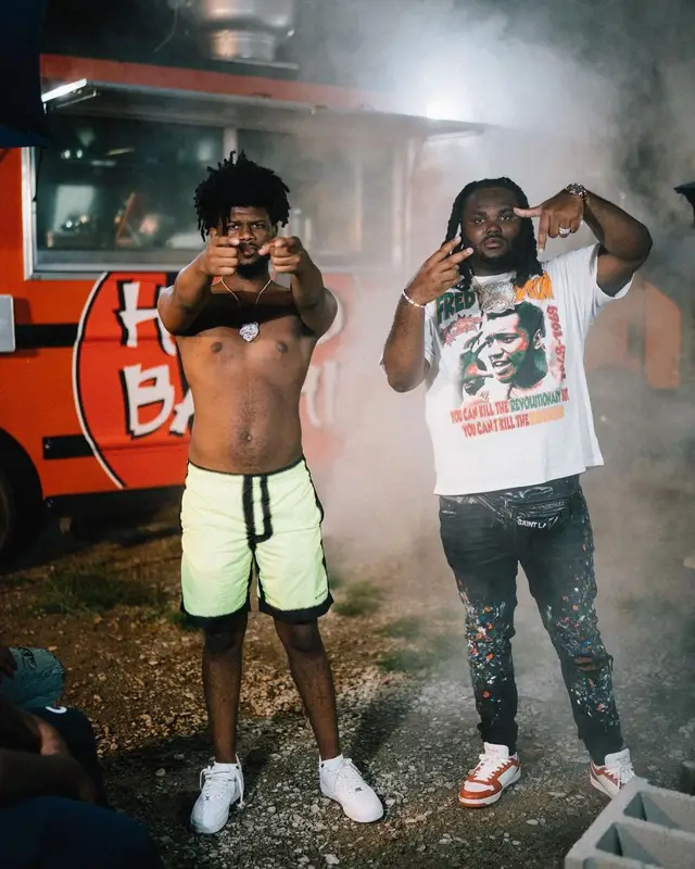 Tee Grizzley outfit in Amiri, Prada, and Saint Laurent, 2022
